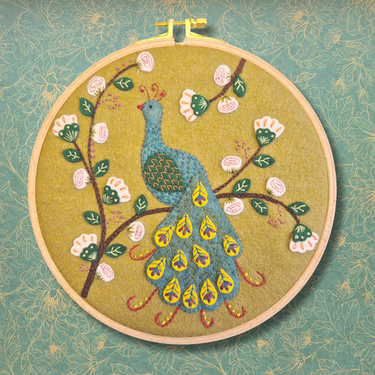 Craft kit with flamboyant peacock appliqué